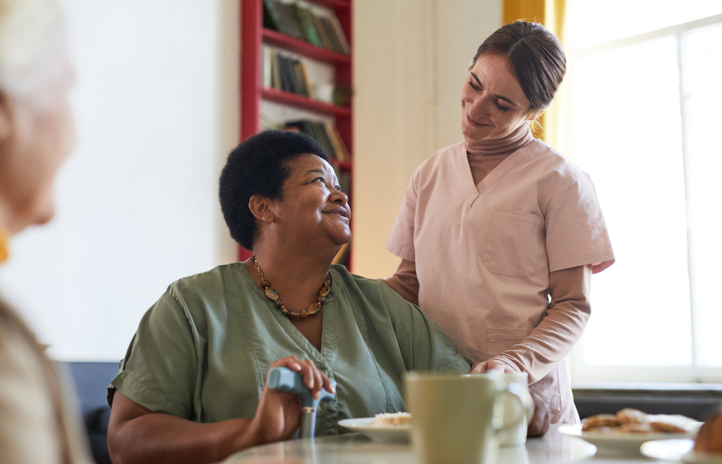 female caretaker with seniors